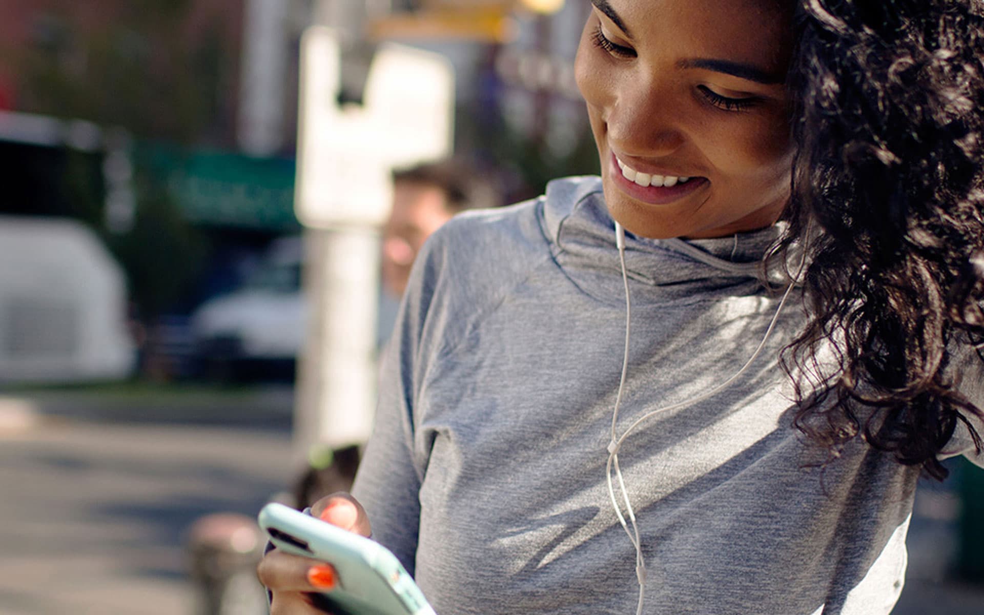 Woman talking on her cell phone in the city